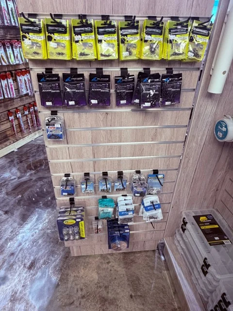 Fishing tackle along the shop aisle