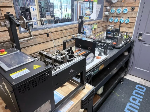 Glass display counter with fishing reels