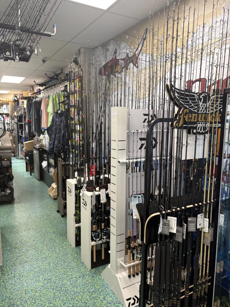 Fishing rods mounted along a shop wall