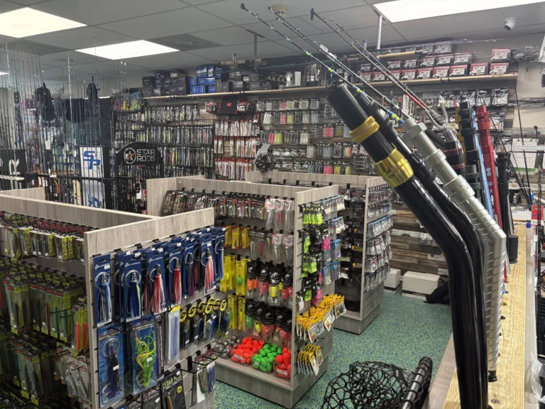 Shop aisle with fishing rods and terminal tackle