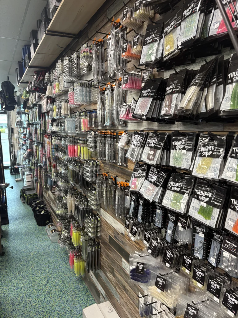 Fishing rod selection beside the shop aisle